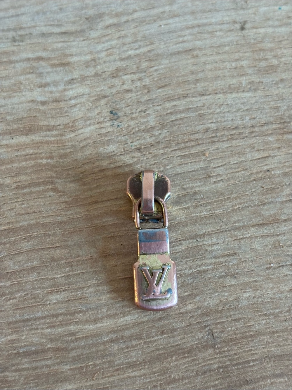 Louis Vuitton authentic Gold LV Zipper Pull Charm